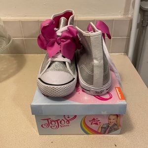 Brand new in box never worn Jojo Siwa glitter high top sneakers. Very cute